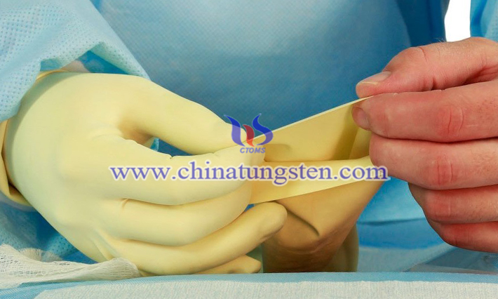 黄色の酸化タングステンを新しい耐放射線手袋の写真に使用